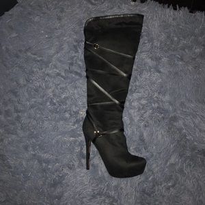 Knee high heeled boots